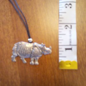 Silver Tone Rhino pendant on black cord